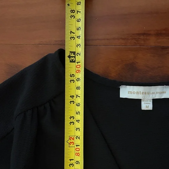 Elegant Black Ruffle Dress - Picture 5 of 7